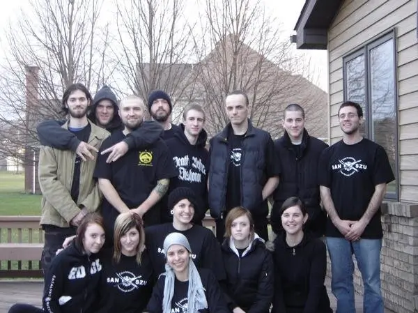 A Three Temples martial training community gathered after a seminar