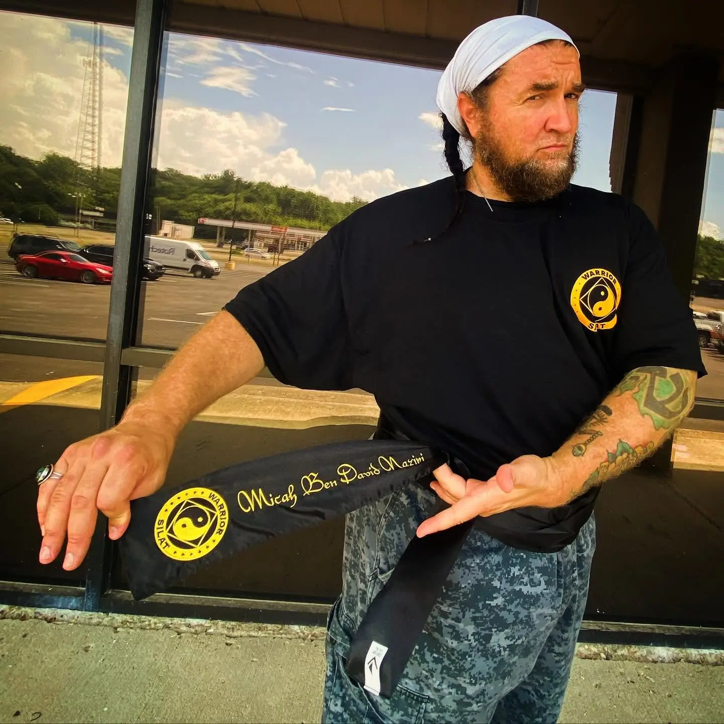 Dr. Micah Naziri displaying his Warrior Silat Black Sash